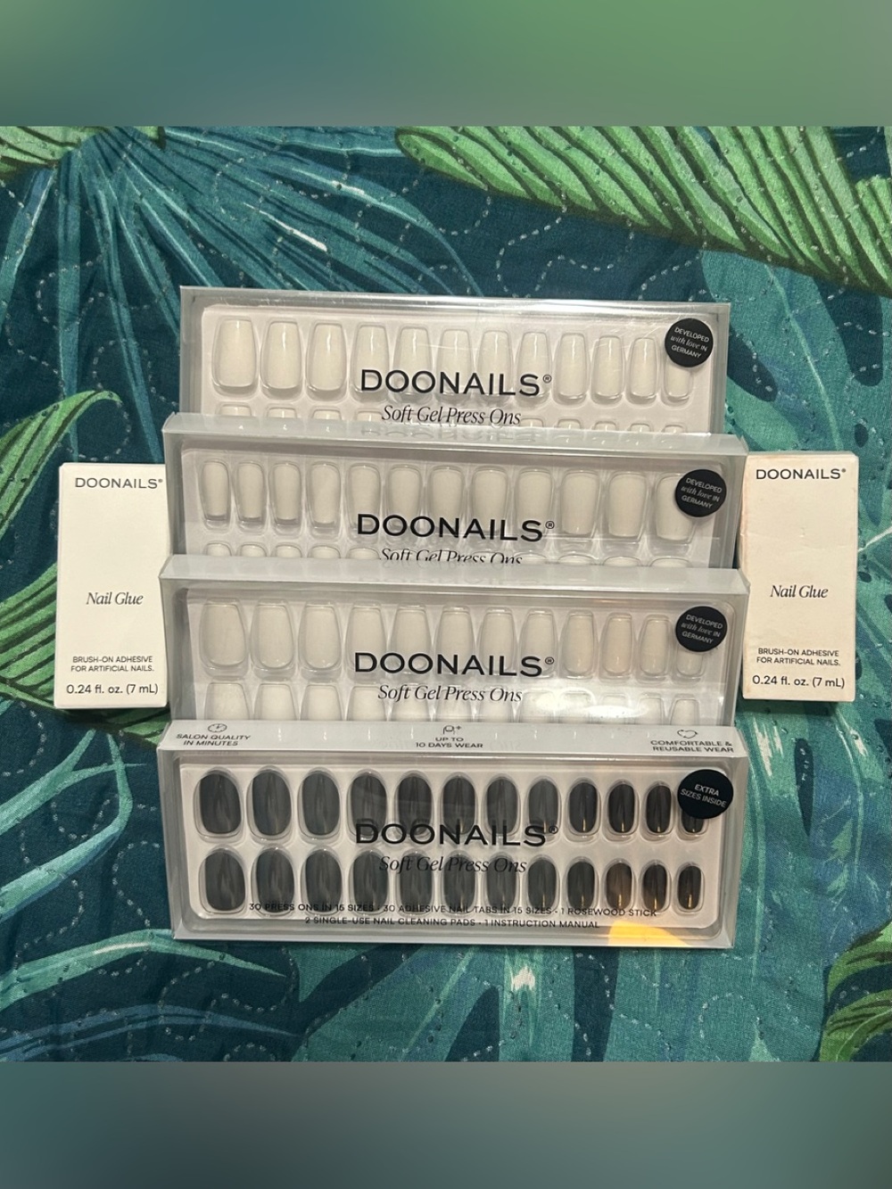 4 Boxes of  Doonails + 2 Brush On Nail Glue - Brand New!